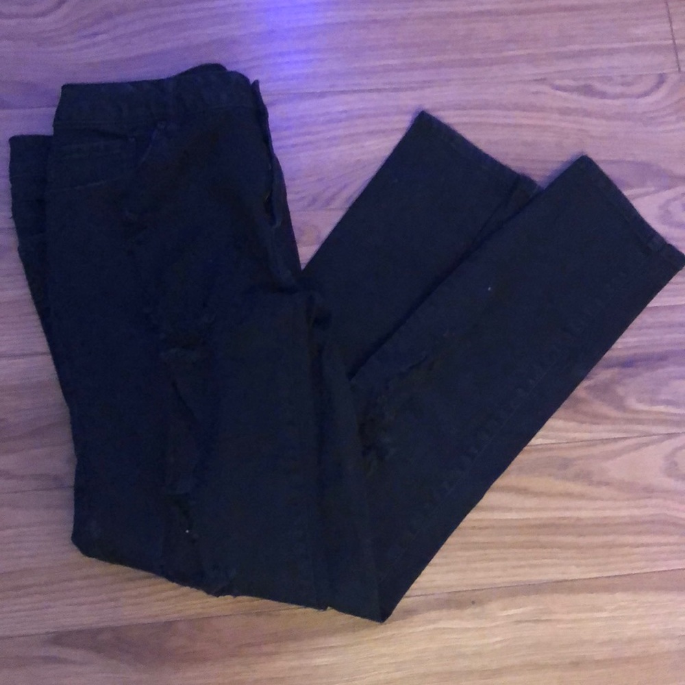 black ripped jeans